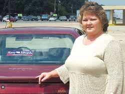 Lynne Gobbell said her boss fired her last week because of the Kerry-Edwards campaign sticker on the back of her car.